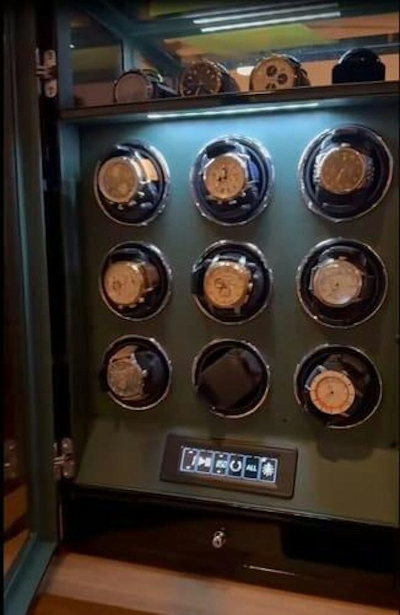Large watch winder cabinet with LED lighting and several watches