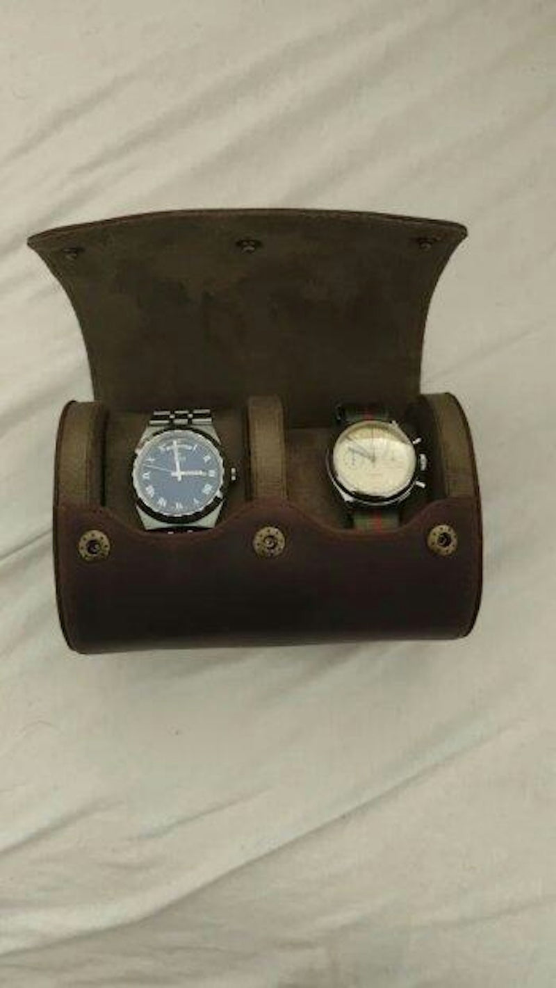 Leather travel watch roll holding two automatic watches